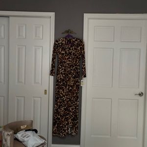 This long dress is a beautiful leopard dress brand new never worn text élan